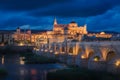 The Mezquita Cathedral in Cordoba, cityscape with the Roman bridge in foreground, Cordoba, Spain Royalty Free Stock Photo