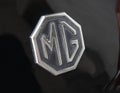 MG classic logo badge of a British car close-up Royalty Free Stock Photo