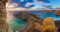 Mgarr, Malta - Panorama of Gnejna and Ghajn Tuffieha bay, the two most beautiful beach in Malta at sunset Royalty Free Stock Photo