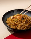 Mi Goreng is a noodle dish cooked with stir-fried vegetables typical of Hong Kong