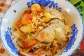 Mi Quang noodle with meat, vegetable, fish, chicken and spices