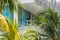 Miami Beach deco architecture and tropical palm tree fronds Royalty Free Stock Photo