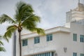 Miami Beach deco architecture and tropical palm tree fronds Royalty Free Stock Photo