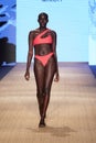 A model walks the runway for MIKOH Resort 2019 Runway Show