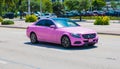 Miami Beach, Florida USA - April 15, 2021: pink mercedes benz c63 amg, corner view