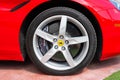 Miami Beach, Florida USA - April 15, 2021: red Ferrari wheel tire with car brand