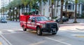 Miami Beach, Florida USA - April 15, 2021: red ford fire rescue truck in miami beach corner view.