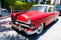 Miami Beach, Florida USA - April 14, 2021: red retro ford, corner view. antique vintage car