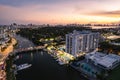Miami Beach, Florida, USA - Evening aerial of Indian Creek and the distant Miami skyline