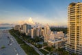 Miami Beach, Florida, USA - Morning aerial view of luxury condominiums and hotels with the Miami skyline in the Royalty Free Stock Photo