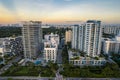 Miami Beach, Florida, USA - Morning aerial view of luxury condominiums with the Miami skyline in the distance Royalty Free Stock Photo