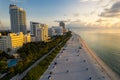 Miami Beach, Florida, USA - Sunrise aerial view of luxury condominiums and hotels with the Miami skyline in the Royalty Free Stock Photo
