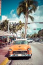 MIAMI BEACH, FLORIDA, USA - FEBRUARY 18, 2018: Vintage Car Parked along Ocean Drive in the Famous Art Deco District in South