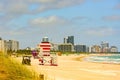 Miami Beach with lifeguard tower and coastline with colorful cloud and blue sky. Lifeguard Post on Miami Beach. Sandy Royalty Free Stock Photo