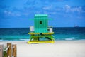Miami Beach with lifeguard tower and coastline with colorful cloud and blue sky. Sunny summer day, with blue sky and Royalty Free Stock Photo