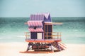 Miami Beach with lifeguard tower and coastline with colorful cloud and blue sky. World famous travel location. Royalty Free Stock Photo