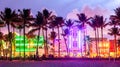 Miami Beach Ocean Drive hotels and restaurants at sunset. City skyline with palm trees at night. Art deco nightlife on Royalty Free Stock Photo