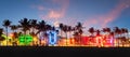 Miami Beach Ocean Drive panorama with hotels and restaurants at sunset. City skyline with palm trees at night Royalty Free Stock Photo