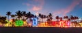 Miami Beach Ocean Drive panorama with hotels and restaurants at sunset. City skyline with palm trees at night. Art deco Royalty Free Stock Photo