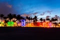 Miami Beach, USA - September 10, 2019: Ocean Drive in Miami Beach at sunset. City skyline with palm trees at dusk. Art Royalty Free Stock Photo