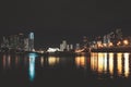 Miami city night. Miami Florida, sunset panorama with colorful illuminated business and residential buildings and bridge Royalty Free Stock Photo