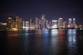 Miami city skyline panorama at night, usa. Skyscrapers illumination reflect on sea water in dusk. Architecture, structure, design. Royalty Free Stock Photo