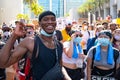 Miami Downtown, FL, USA - MAY 31, 2020: Black man and white women protesting murder in Minneapolis. People fight for Royalty Free Stock Photo