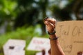 Miami Downtown, FL, USA - MAY 31, 2020: Hand with jewelry in a gesture of struggle. Black people fight for their rights