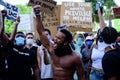 Miami Downtown, FL, USA - MAY 31, 2020: Protests for the rights of black people. Emotional man with black skin holds his