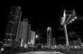 Miami Downtown modern buildings at night from a dark street. Black and white Royalty Free Stock Photo