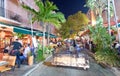 MIAMI - FEBRUARY 25, 2016: Tourists along Espanola Way on a beau