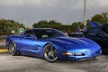 Blue Chevy Corvette in a parking lot