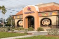 Exterior of Taco Bell fast-food restaurant with sign and logo. Royalty Free Stock Photo