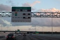 MIAMI, FLORIDA -8 MARCH 2019- View of a tollbooth on the road at the entrance. Sunpass holders go through an express lane