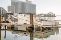 Miami, Florida - September 16, 2017: Sunken boat on Brickell Bay avenue marina days after hurricane Irma strikes the city during