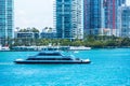 Miami, Florida - small ferry boat sailing through Miami Bay waters.