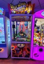 Miami, Florida, U.S - February 18, 2024 - The Willy Wonka arcade prize game machines illuminated with bright neon lights Royalty Free Stock Photo