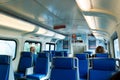 Blue Seats inside passenger wagon in Tri rail train on platform in West Palm Beach, Royalty Free Stock Photo