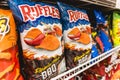 Ruffles Flamin Hot BBQ crinkle-cut potato chips for sale at a supermarket