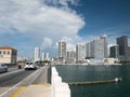 Miami, Florida, USA. August 2019. Cars on Miami Venetian Causeway Drawbridge and Miami skyline in background Royalty Free Stock Photo