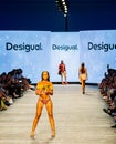 Art Heart Fashion Miami Swim Week - Desigual Fashion show. Models walking runway.