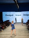 Art Heart Fashion Miami Swim Week - Desigual Fashion show. Models walking runway.