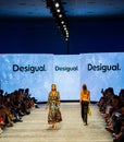 Art Heart Fashion Miami Swim Week - Desigual Fashion show. Models walking runway.