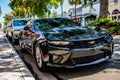 Miami, Florida USA - March 25, 2023: black 2016 Chevrolet Camaro 1LT Chevy car vehicle, front view