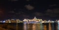 Miami, Florida, USA - MAY, 2020: Big white cruise ship docked at the port of Miami at night. Large luxury cruise ship on Royalty Free Stock Photo