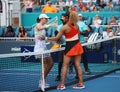Tennis players Iga Swiatek of Poland L and Naomi Osaka of Japan by the net after women`s final match at 2022 Miami Open