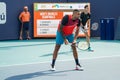 Australian tennis players Nick Kyrgios L and Thanasi Kokkinakis in action during 2022 Miami Open men`s doubles semifinal Royalty Free Stock Photo