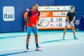 Australian tennis players Nick Kyrgios L and Thanasi Kokkinakis in action during 2022 Miami Open men`s doubles semifinal Royalty Free Stock Photo