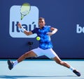 Felix Auger-Aliassime of Canada in action during round 3 match against Francisco Cerundolo of Argentina at 2023 Miami Open