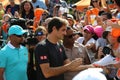 Grand Slam champion Roger Federer of Switzerland signs autographs after his win at 2019 Miami Open final match